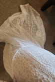 This dress is very simple but beautiful, the lace is perfect for a summer wedding, but the size is a little big, I tried small ( I'm usually S ) and the chest area was huge, I changed it for an xs it was tight but it looks better.
I plan to lose weight. I'm still struggling with the chest, I was thinking maybe some sticky inserts would help but maybe it's not the dress for my body type. - Estefany L.