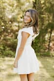 This dress is perfect and appropriate for high school graduation. The length is perfect and the fit is amazing and comfortable. Added bonus- pockets, but they are seamless in the dress so you can't tell! - C M.