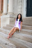 I bought this dress for my graduation photos and it was perfect! The fit is great and the style is very classy. I am 5'2" and got a size XS. The material is perfect for warmer weather and the detailing is super pretty. It is also not see through with the extra lining, which is always nice! Definitely recommend it! - Joan R.