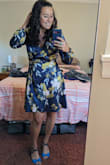 I bought this in a M and a L -- I'm generally a size 8 or 10 -- and ended up going with the large. I felt like the large sleeves a were a little long and billowy, and also felt like the waist was a little tight somehow. The medium was WAY too open in the chest for my taste. 

Got lots of compliments on this regardless and will keep! - Jessica L.