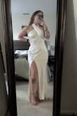 This dress is my rehearsal dinner outfit and it fits soooo nicely. I like that the neck ties so it can be adjusted and the material feels really good. It needs steamed a bit but otherwise great quality! - Shanna F.