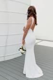 Bought this for my 10 year vow renewal and it was perfect! The quality was great and I love how it shaped me. If you're between sizes and you're curvier in the hip/thigh area, I'd say go up in size. - Ashley C.