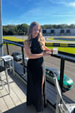 The dress was beautiful exactly what I wanted for a classy look.  It's a halter with no back, so the sides were a little loose for my flat chest but if you support more than a tennis ball, it'll fit like a dream! - Cortney O.