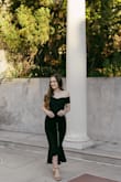 In love with this dress! Fits well through the hips and hugs the shoulders so it doesn't slip down the top. Wore this for graduation photos, and this piece truly elevated the whole look! Highly recommend - Grace M.