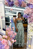 The dress is beautiful with very high-quality material. Unfortunately, it runs so small. I had to order two sizes up. lt was still snug around the waist area. The bust then ran too big and had to take in. However, absolutely love the style and got so many compliments - Yahayra H.