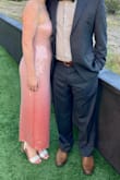 Beautiful dress with light pink and darker coral at the bottom. Tons of compliments and beautiful sparkle. It sheds a few sequins, but nothing unexpected. - Laura V.