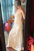 This review and pictures are for the size Small (I originally got XS but it was too tight in the bust; I couldn't breathe) I love this dress, though! It's nice and light for an August wedding. I plan to add some upper arm cuffs - Amanda M.