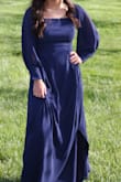 My daughter loved her dress. I had to hem it, as with any dress I buy, because she is short, but it was easy to do and fabric as great to work with. The dress was flattering. - Ruth E.