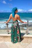 I bought this dress in green for a beach wedding. It's beautiful and I received so many compliments on the dress. I'm short so I had to tailor the length of the dress and it was big in the chest area but it wasn't that noticeable. This dress is made for large breasted women. Other than that, the dress is great! I love the fabric, I love the colors and it was perfect for my beach wedding - Azalia R.