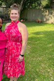 It fits really well and is flowy - the waist tie brings in the waist which is good for curvier girls. - Grace J.