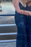 This dress was such a win! It fit beautifully, looked great, and the material was actually very comfortable. The lacing on the back was easy to adjust (pro tip: knot the straps at the very top loop and then lace) and was the right amount of fun and classy. - Eva V.