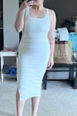 What a great dress for all body types! I love the snugness with the flexibility. I think it does a great job of hugging all the right areas while still being able to move pretty freely! Length is perfect and also adjustable with the way the material is. All around a beautiful fit! So excited to wear it!! PS: the mark that looks like it's on my chest is actually on my mirror- not the dress! - Sirena W.