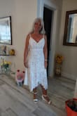 I am writing this review before the event I am wearing it for. I purchased this dress for a semi casual wedding in Italy. All the wedding guests have to wear white! The wedding is May 7th. I purchased 4 dresses. All 4 fit great. All 4 were well made. I was so impressed by all the choices Lulus had to offer. This dress is lined, beautifully made and perfect for the occasion. This dress fits perfect and so comfortable. I will feel good and confident when the time comes to wear it. I am sending a picture of when I was just trying it on for my sister. So excuse my hair and no makeup. Thank you! - Donna M.