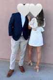 I wore this dress to our civil ceremony and it was perfect! It wasn't see-through, but I did wear spanx underneath because it is very short. If you have a small chest, there will be a lot of space/extra fabric in the top even after tightening the bow. The top fabric is almost like a shiny satin while the bottom has an overlay of tulle. Overall, I think it is a great quality dress for the price! - Shannon K.