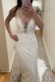I was very excited about this dress. The detail is much better in person; I was very impressed. The pearls are beautiful. It looked too revealing on my body so I decided on a different dress. I would have definitely needed this altered and hemmed if kept; it was very long and I am 5'2. Otherwise, it was very pretty and would still recommend. - Mary J.