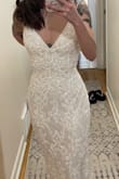 As with other Lulus dresses, the detail is so much better in person. It was very sparkly, I was impressed. However, the dress felt pretty heavy and the straps were a bit long. I would have definitely needed the dress hemmed and altered if kept, I'm 5'2" and it was too long. I decided to not go with this one because I felt like the open back was too revealing on me personally. Also, it was pretty loose on my waist. This could totally be beautiful on someone else though. - Mary J.
