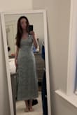 Fall in love with this beautiful sage green spring dress! The quality is just amazing and the straps can be tied to loosen or tighten the dress to your liking! Fits like a glove! Definitely will have a mimosa in hand while wearing this dress during the spring and summer months! Highly recommend - Randa Z.