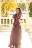 Beautiful dress, I'm petite size and I had the sleeves cut a little and the length of the dress - Raquel M.