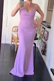 This is such a flattering mermaid shape, nice and long for anyone over 5 foot five& Nice tight material, I bought it in a small, medium and large and went with the small. The snug fit looked best. This photo is without shapewear or heels. Very comfy! - JH H.