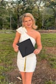 I absolutely LOVE this dress. It's just a tiny bit snug, but it has stretch to it and is very flattering!!! The price is great for the quality. If you want the perfect grad dress, then definitely buy this one! - Shaylyn C.