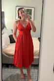 This is more an orange than bright red in person. - Katherine K.