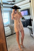 I wore this dress to a fundraiser event and received all the compliments. True to size. It's short, but that was expected. I loved the high neck and cap sleeves. A great dress for an upscale event! - Janice Z.