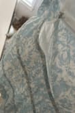 I bought this for a baby shower, and I tried this on and it ripped on the side. I will be returning this. I really loved this on the model, I am a size M. - Shaina