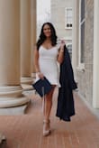 I love this dress!! Got it for my graduation. It's the perfect length and I love the one shoulder! Fits true to size. - Natalie F.