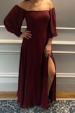 I love this dress. I just had to cut the bottom because it was too long for me. I had to pay an extra $100 and change for it. - Elizabeth R.