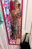 The stock image of the dress on the website caught my eye, but when l I saw photos of reviewers looking so boho-chic or like they were straight out of Mamma Mia, I knew I had to order it. Once I put it on, I immediately felt fun and flirty. I need this in multiple other colors. Don't judge me! The quality is fantastic; it is lined which helps prevent those dreadful body imperfections or go even bra-less. But my favorite part of this dress is the sleeves; both different but they flow perfectly together. It's truly beautiful and slimming on. This will for sure be your favorite summer purchase - Andrea G.