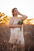 Dress was perfect for my wedding reception. I loved how great the material quality is and it was comfortable. Not too short. - Michelle M.