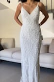 This dress is absolutely wonderful; it fits the body perfectly, and the fabric is of incredible quality. The details look like tailor-made atelier. - Paloma J.