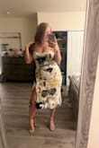 I love this dress. I'm curvy and have a large chest/ butt and it fit perfectly. I wish it came in different colors! - Jenna Y.