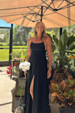 This dress was exactly what I wanted. The material was not cheap feeling, and very nicely lined. Half of my event was outside in Florida, the other half was inside. This dress was perfect for both! My only complaint would be the straps. They don't stay tight. I was constantly adjusting them and my shoulders to try to keep them in place. But everything else about the dress made up for that. You could probably put a little safety pin or even add a stitch to fix it, I just didn't have time. The slit was just enough, and I didn't have a problem with it opening up when walking. The breeze while outside was a little concerning, but nothing you couldn't handle. I received endless compliments, and can't wait to need to wear it again! If I have a need, I will probably order it in another color!! - Becky W.