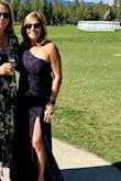 The dress material is very pretty and the perfect weight with a tiny bit of stretch to it.  The navy color was really beautiful.  The fit was perfect but actually fit better on top using a strapless bra (I was able to use the shoulder strap to the bra on one side!).  The dress was comfortable and I had so many compliments on it.  The slit really adds to the dress!  I was really pleased with this purchase. - Sammi T.