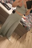 It fitted better than I expected and looks great. The top would have been on the big side for me, but with the lace, it's adjustable so it still looks good. The pants are a bit long but with some heels, it's perfect. - Esmee J.