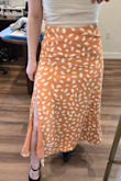 I like this, and the color is amazing! The issue is that I have wider hips and a smaller waist, and this skirt isn't flattering. the top part is way too big for my waist but there is no give in the hips to get a smaller size. Won't return, but I'll probably have to belt it when I wear it. - Sarah M.