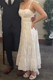 I had gotten this dress for my small courthouse wedding and I absolutely LOVED it. The price was fair, the size was perfect, and I didn't NEED heels for it to fit my length. With me being short that's usually the case, but it didn't hit the floor even without my heels on. I also love that it didn't accentuate my lack of boobs, so it still looked flattering for those in the IBTC. I adore this dress! - Gillian G.