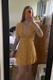 I love this dress! I did not have enough boobs to fill it out though, so I sewed the neckline to avoid any wardrobe malfunctions at my bridal shower. - Hannah Y.