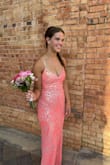 I bought this for my daughter to wear to prom.  She received so many compliments.  It is absolutely gorgeous in person and true to size.  The color is goes very well with a pretty tan. - April A.