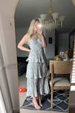 Bought this dress for a potential wedding. The bust and rib area are slightly large in my opinion. Not sure if I will be keeping it yet. - Chloe P.