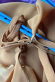 This is the second time I have ordered from Lulu, and, again, their quality is not worth the price. Before even trying on the dress the strap on the ruffled side became detached, so the string would slip out of the adjuster. I was able to use fabric glue to put it back, and I'm hoping it stays put for graduation. Other than that style and color is accurate... - Abeni T.