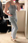 It's a cute jumpsuit but it has its flaws. I wasn't expecting it to be so stretchy, which if that's your thing - cool, but it gives it a fake jean feel/ look that I honestly don't think is worth price-wise. Secondly, unless you're 5'7, expect to hem A LOT off. I had to take four inches off the bottoms, which sucks because they aren't a true flared bell bottom anymore :/ - Emily H.