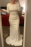 This dress was exactly what I wanted and fit amazing! I was impressed by the material and overall quality. I'll just need to do a few small alterations. I can't wait to wear this to my wedding! - Alison O.
