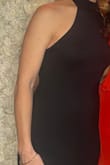 I wish the top was a little smaller. I had to tape it the sides in the back, but other than the dress was wonderful and very flattering. - Tara B.