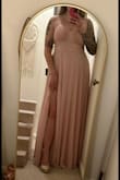 This dress is super soft and comfortable! it fits me very well. I feel like I can not worry about the girls falling out but I don't have to wear a bra, and it's also loose enough on the tummy that I don't need shapewear and can enjoy eating freely without feeling bloated and uncomfortable in a tight dress. the slit is very sexy! it zips up really easily. the fabric is flattering around the chest/back/ribs. and very flowy below that. also the color is gorgeous. A warning for not super tall people: I am 5'8" and I am wearing platforms with a 4" heel and the fabric is still on the floor. I can walk okay but will need to lift for stairs etc. so if you are shorter than than/plan on wearing shorter shoes you will need this tailored. - Adele L.