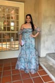 I got this dress for a garden wedding. The dress was perfect for the venue. Beautiful colors; it's a little bit puffy than the pictures. I had to tailor it a little bit on the sides, and it turned out perfect! The back is beautiful. - Barbara R.