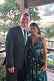 I received a lot of compliments on my dress. The dress fit true to size; it is long, but I'm short (5'2) so I have to fix it. The material is like a tulle. The back of the dress is open; the neckline is very low. I used tape to keep the dress in place in that area. - Barbara R.