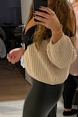 Chunky, loose cable knit sweater that you can dress up or down. Very comfortable and looks just as pictured on the site. Still wearing it in fall and winter 2 years later. :-) - Christel H.