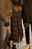 Bought this for a trip to cold New York - love the extra long length for more warmth. The velcro around the neck for the hood did come facing the wrong way, though, so I had to have it altered but I wear it whenever it's a really cold day/night anywhere - Christel H.